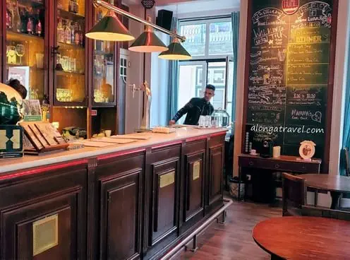 Sweet Home Lisbon hostel bar with schedule of social activities