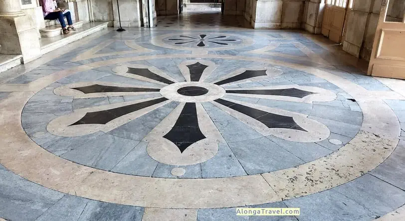 Multicolored marble star on a floor of a church in Estrela area of Lisbon