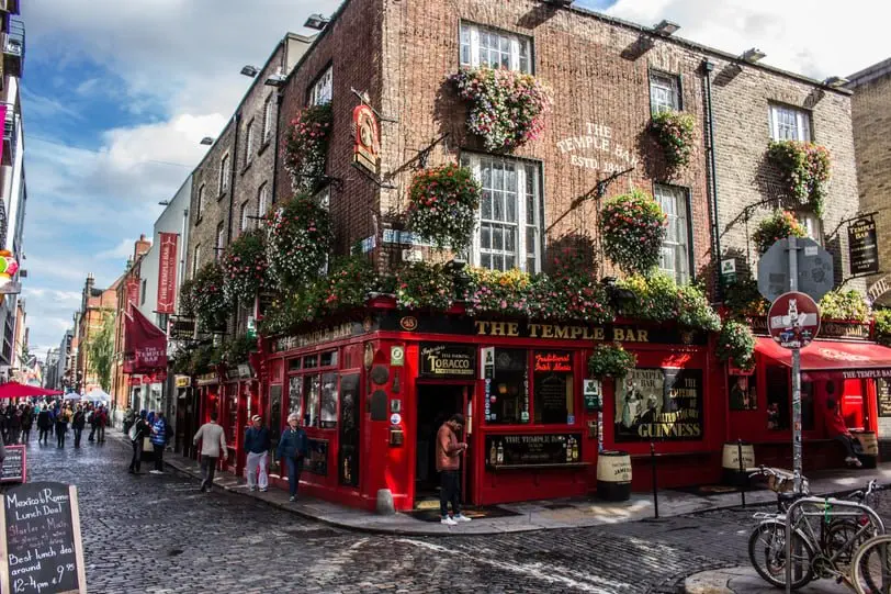 Red iconic The Temple Bar in Dublin, one of the cheapest cities in Europe to fly into from the US