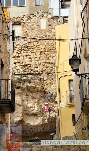 a house built on a cliff in Espluga