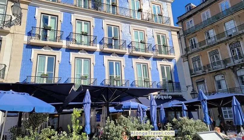 Incredibly beautiful blue house with blue sunshade in the cafe on Avenida da Liberdade