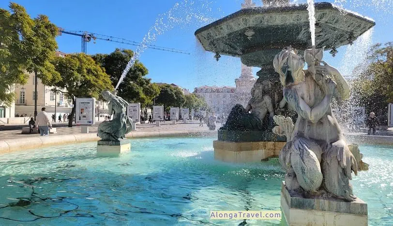 Blue water of an old beautiful fountain in Lisbon