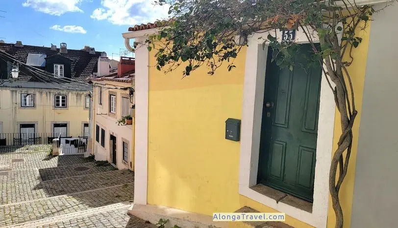 Yellow old house in an old picturesque neighborhood in Lisbon
