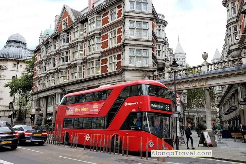 Red double decker bus on the streets of London, one of the cheaper places to fly into Europe