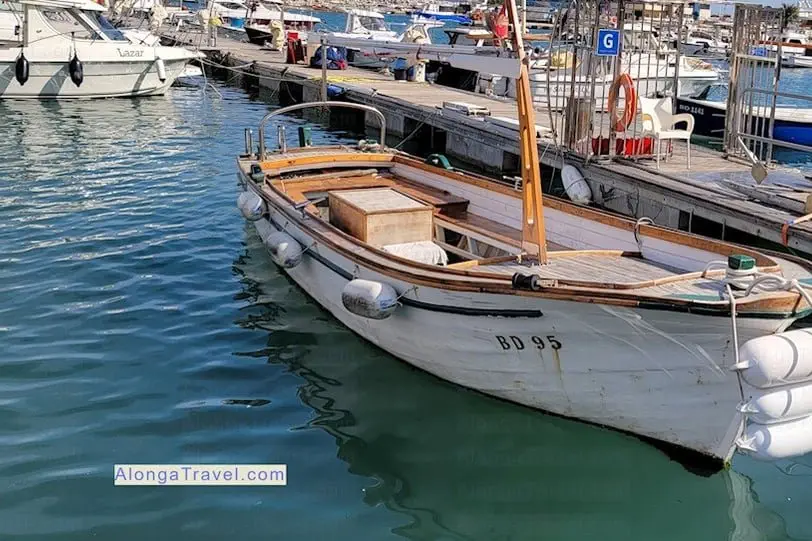 A few boats and yachts on the background in the marina in Montenegro