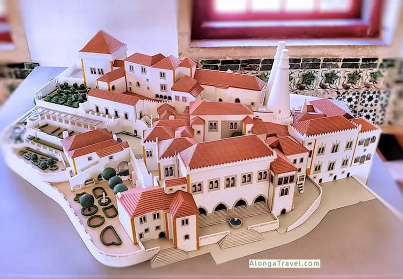 A miniature 3-D factual replica of a few white buildings adjusted together of Sintra National Palace