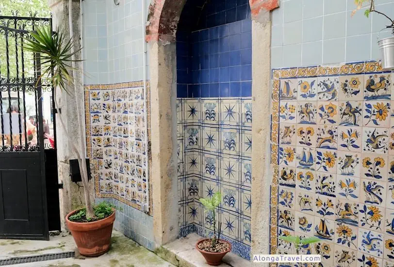 Azulejos covering an inner yard of a Pombaline building with floral motives
