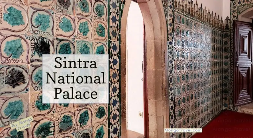 exotic looking wall covered by colorful ornamental tiles & a sign: 'Sintra National Palace'