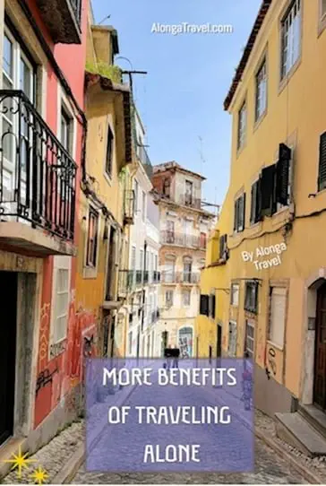 A narrow lane in Europe & a custom sign: 'More benefits of traveling alone'