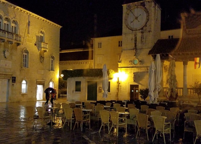 Trogir Square at night beautifully illuminated with yellow lights