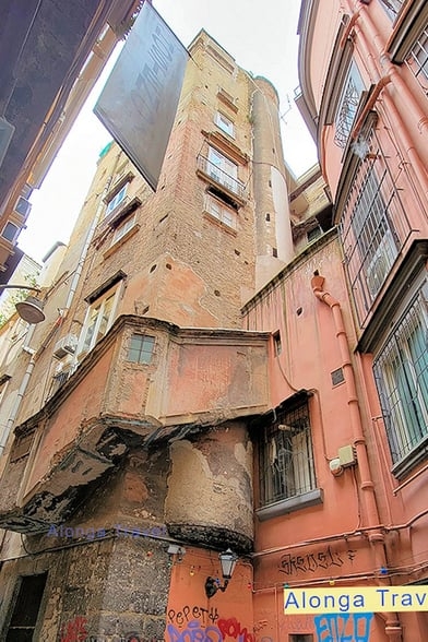 Ancient building with many addition all in different architectural styles in Napoli, Europa