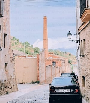 Tall pink chimney of Fassina Balanyà