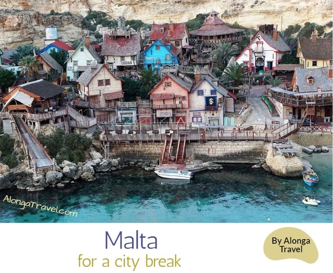 Colorful houses on Malta & a custom sign: 'Malta for a city break'