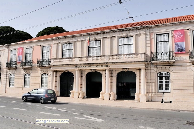 Salmon neoclassical building the Royal Riding Hall of Belem hosting National Coach Museum