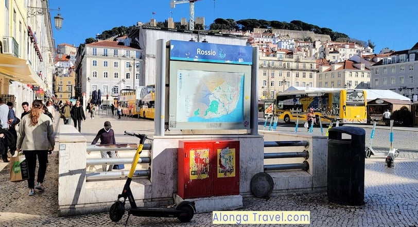 An entrance to Rossio station of Lisbon metro with buses around as part of public transport in Lisbon