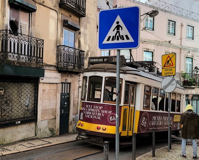 Tram 28 on the streets of the most fun neighborhoods riding on a narrow steep street